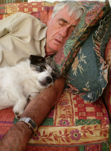 Lazy man busy not training a dog